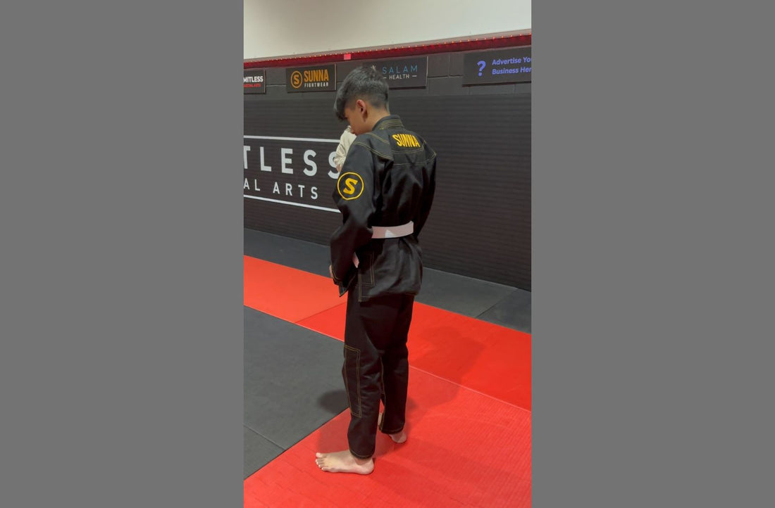 Athlete in premium black bjj gi