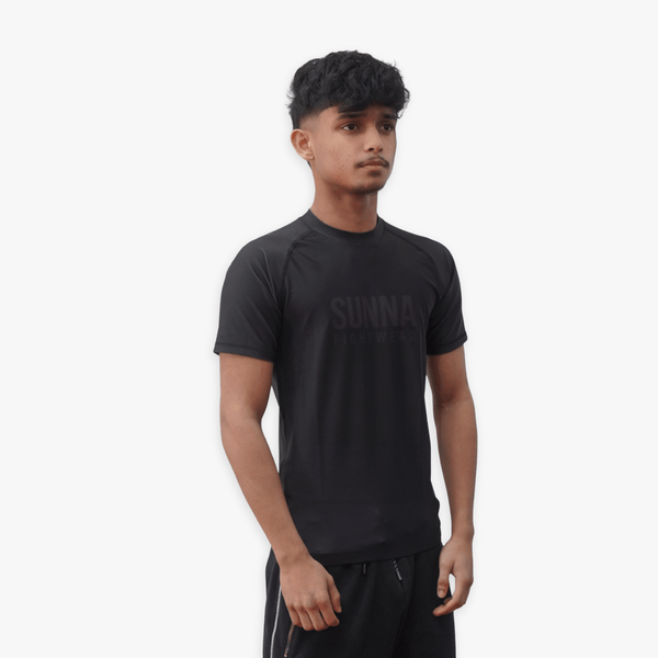 Sunna Fightwear Essential Series rashguard front angle - premium no-gi BJJ compression top for Brazilian Jiu-Jitsu
