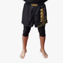 Awrah hybrid fight shorts front view - Sunna Fightwear modest BJJ shorts with extended length for halal training